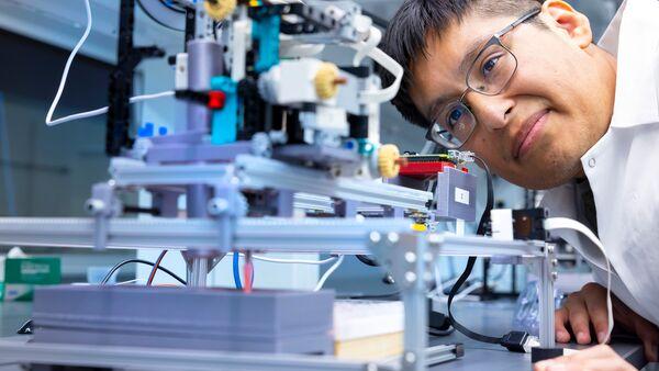 Student with machinery